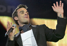 Robbie Williams: 20 anni di carriera nell’ album “The Greatest Hits 1990-2010″